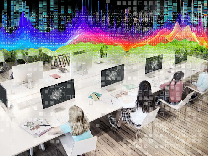 Students at computers with screens that include a representation of a retinal scanner with pixelation and binary data overlays and a brightly coloured datawave heatmap at the top.