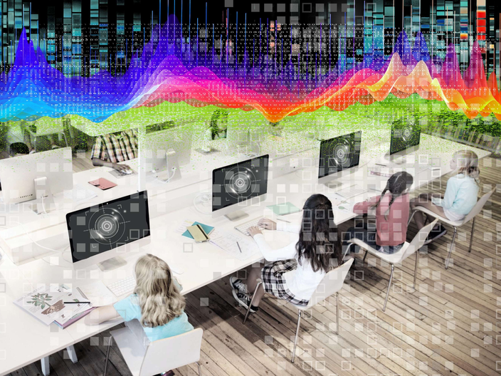 Students at computers with screens that include a representation of a retinal scanner with pixelation and binary data overlays and a brightly coloured datawave heatmap at the top.