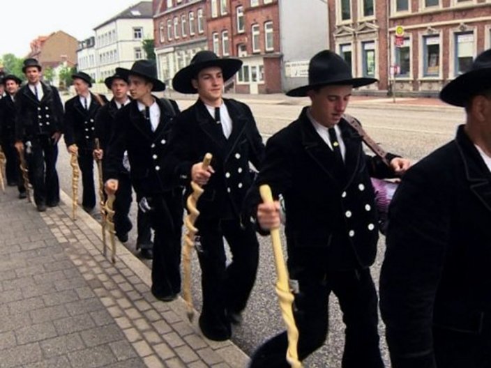 Gruppe von Handwerkern in Zunfttracht